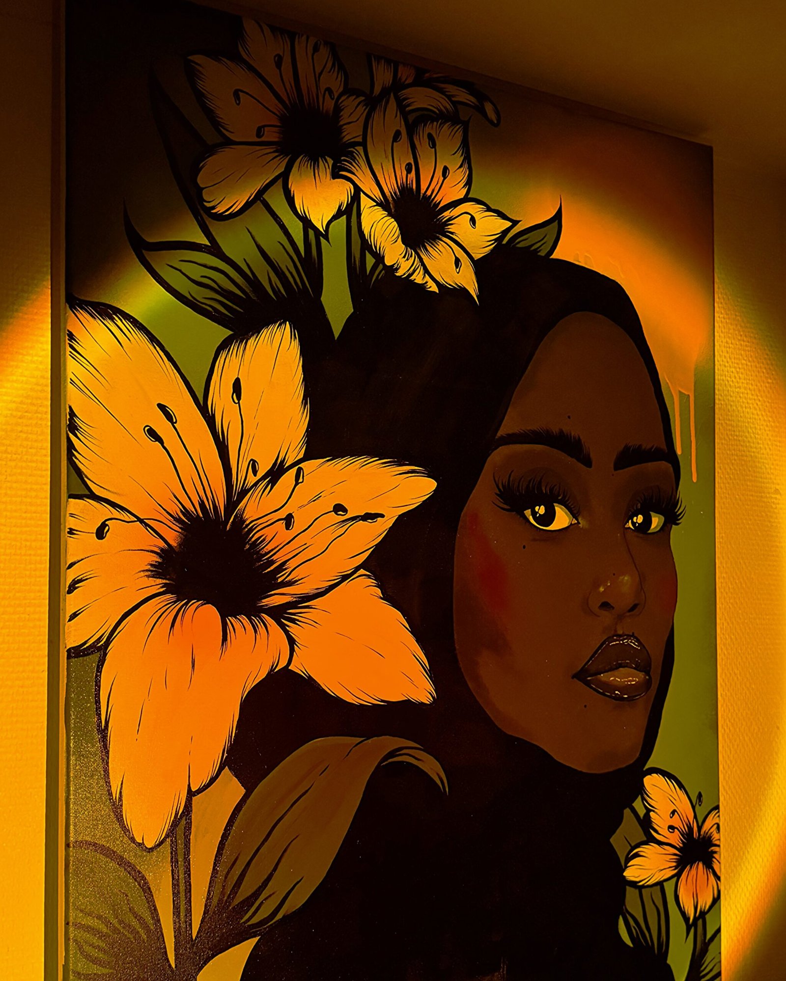 Painting of a Black Muslim woman in a hijab surrounded by vibrant lilies - artwork by Lehbie